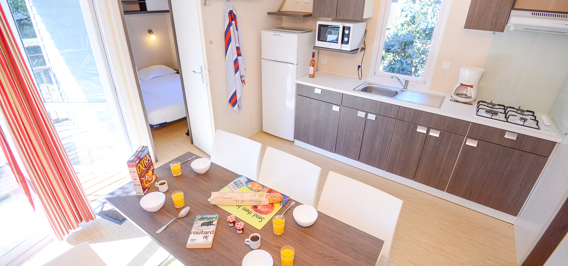 Camping la vetta location MH confort 3CH LIT SUP table cuisine